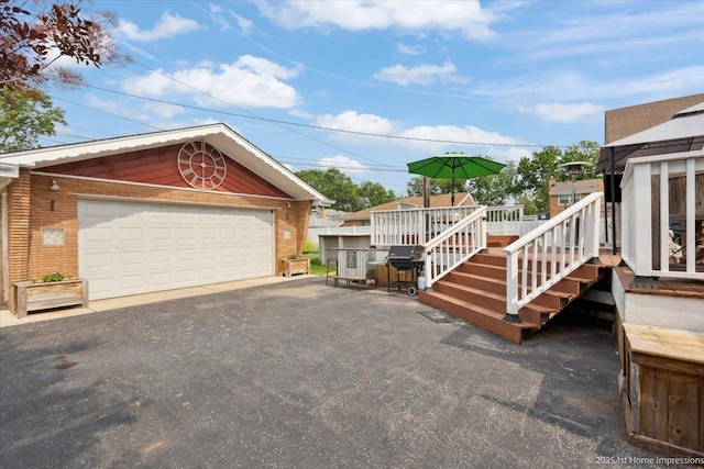 9122 S Avers Ave, Evergreen Park, IL 60805 - view of side of home with a detached garage, an outdoor structure, and brick siding