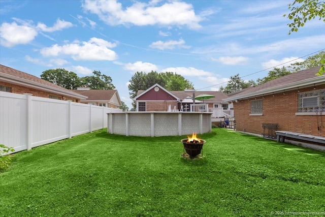 9122 S Avers Ave, Evergreen Park, IL 60805 - view of yard featuring an outdoor fire pit