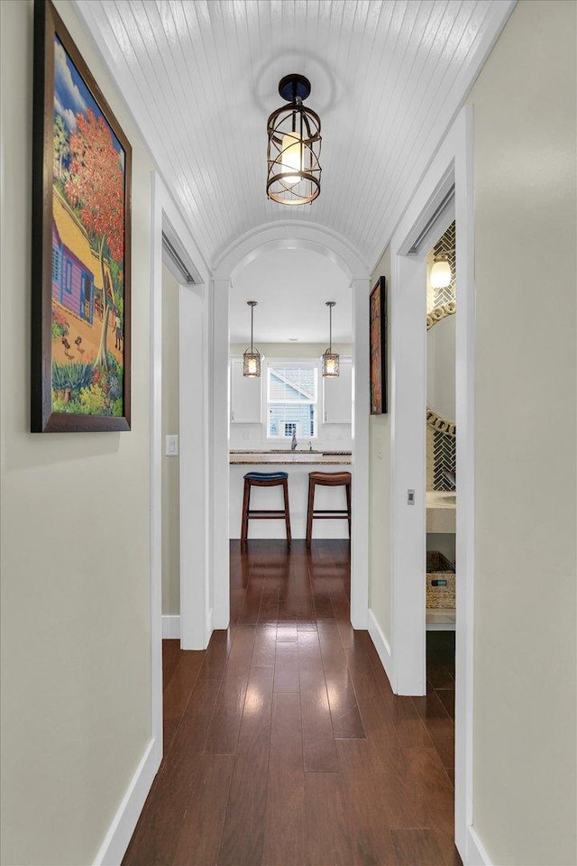 2955 E Stone Creek Blvd, Urbana, IL 61802 - corridor featuring dark wood-style floors and vaulted ceiling