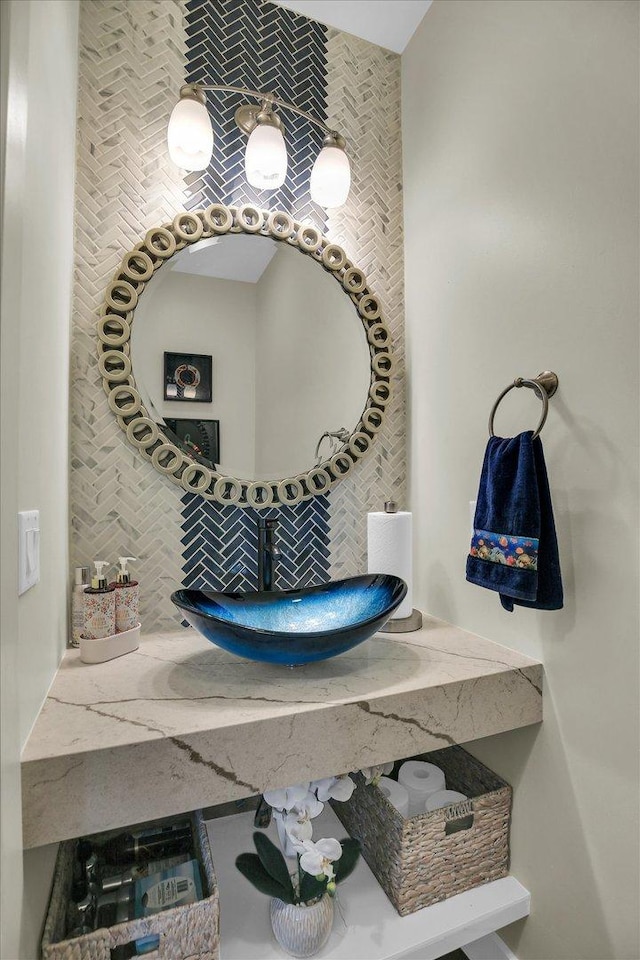 2955 E Stone Creek Blvd, Urbana, IL 61802 - bathroom featuring backsplash and vanity