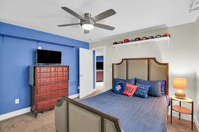 2955 E Stone Creek Blvd, Urbana, IL 61802 - carpeted bedroom with baseboards and a ceiling fan