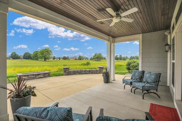 2955 E Stone Creek Blvd, Urbana, IL 61802 - view of patio featuring a ceiling fan