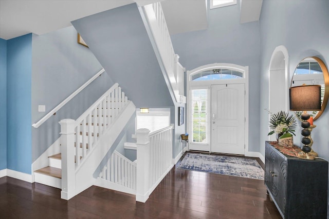 2955 E Stone Creek Blvd, Urbana, IL 61802 - entryway with wood finished floors, stairs, and a towering ceiling