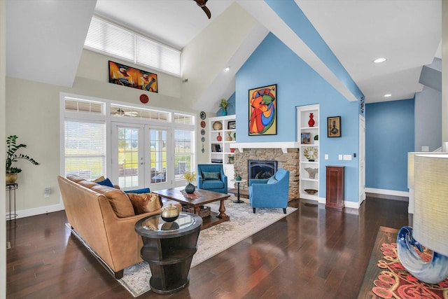 2955 E Stone Creek Blvd, Urbana, IL 61802 - living room featuring french doors, wood finished floors, a stone fireplace, recessed lighting, and built in features