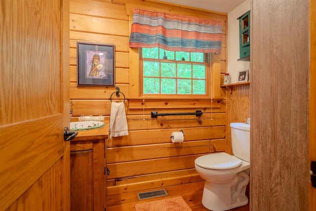 13153 E 1920 N Rd, Pontiac, IL 61764 - bathroom featuring toilet and wooden walls