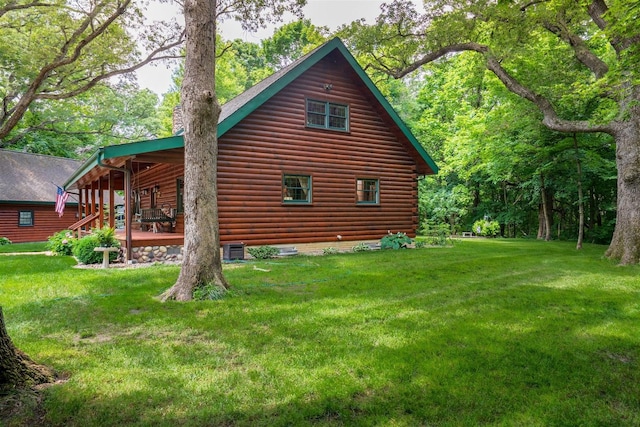 13153 E 1920 N Rd, Pontiac, IL 61764 - view of side of property with a lawn and log veneer siding