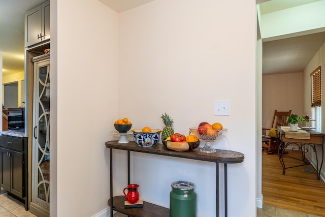 2417 Lyons St, Evanston, IL 60201 - kitchen with baseboards and light tile patterned flooring
