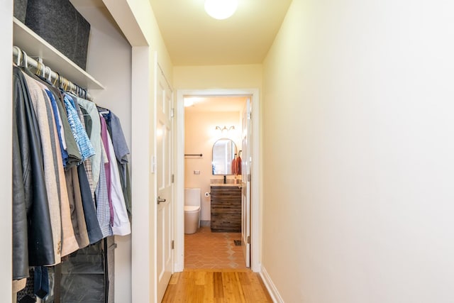 2417 Lyons St, Evanston, IL 60201 - corridor featuring light wood-type flooring