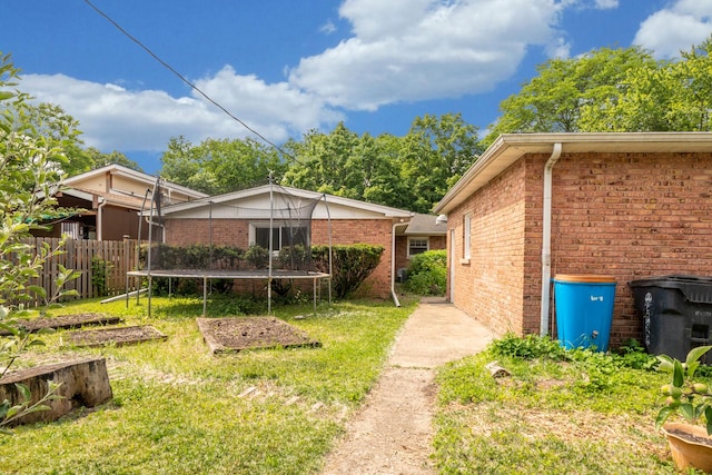2417 Lyons St, Evanston, IL 60201 - view of yard with a trampoline