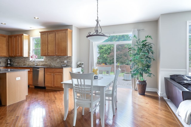 606 Ebony Dr, Oswego, IL 60543 - dining room featuring healthy amount of natural light, light wood finished floors, and recessed lighting