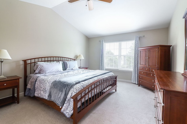 606 Ebony Dr, Oswego, IL 60543 - bedroom with lofted ceiling, light carpet, and a ceiling fan