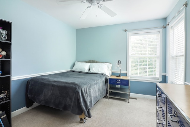 606 Ebony Dr, Oswego, IL 60543 - bedroom with light carpet and ceiling fan