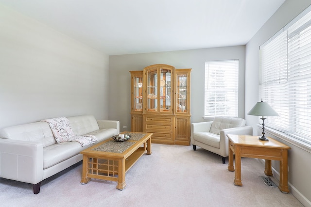 606 Ebony Dr, Oswego, IL 60543 - living area with light carpet