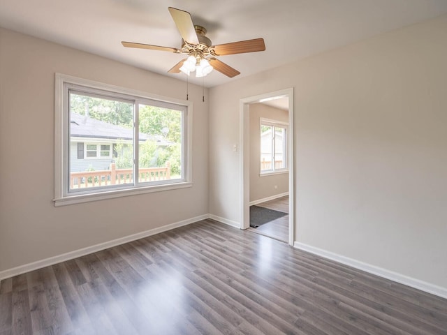 566 Glendale Ave, Wheaton, IL 60137 - unfurnished room with plenty of natural light, wood finished floors, and ceiling fan