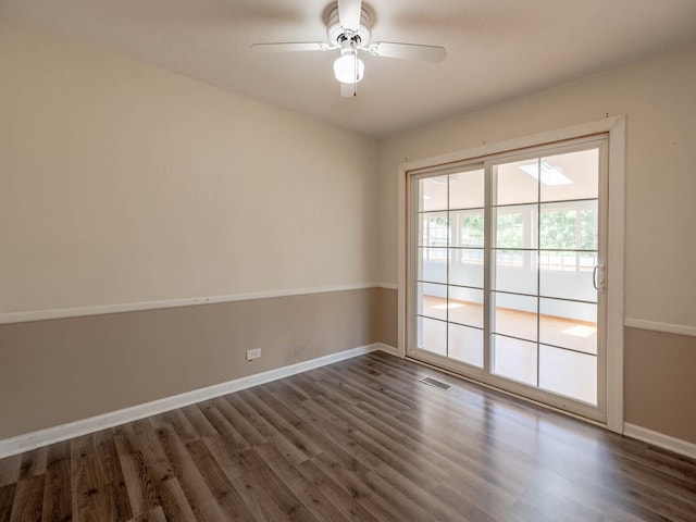 566 Glendale Ave, Wheaton, IL 60137 - empty room with dark wood-style flooring and ceiling fan