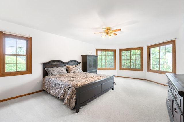8025 Kirkcaldy Ct, Palos Heights, IL 60463 - bedroom with multiple windows, light carpet, and ceiling fan