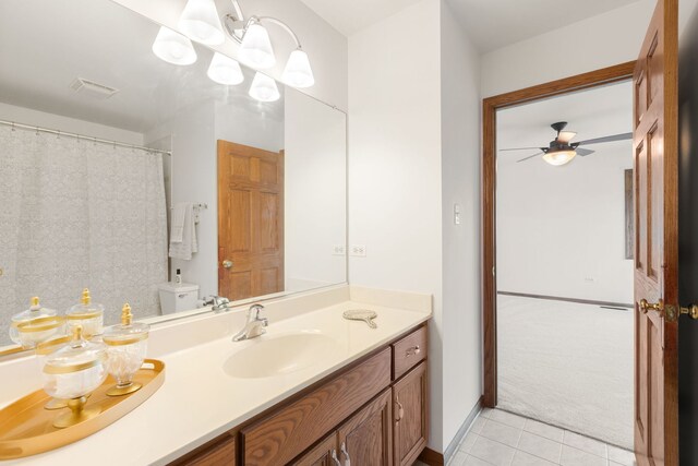 8025 Kirkcaldy Ct, Palos Heights, IL 60463 - bathroom with tile patterned floors, vanity, and ceiling fan