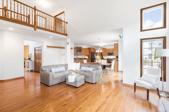 8025 Kirkcaldy Ct, Palos Heights, IL 60463 - living room with a high ceiling and light wood-style flooring
