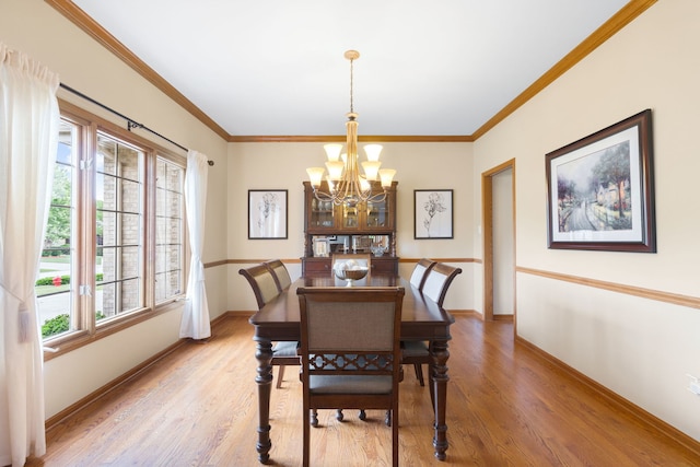 8025 Kirkcaldy Ct, Palos Heights, IL 60463 - dining room featuring a chandelier, light wood finished floors, and ornamental molding