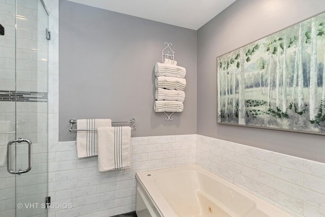 1580 Verde Ln, Mundelein, IL 60060 - bathroom featuring a jetted tub, a stall shower, and tile walls