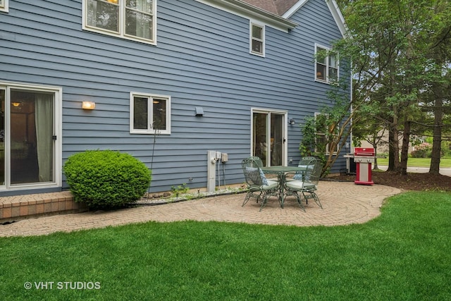 1580 Verde Ln, Mundelein, IL 60060 - rear view of property with a patio area and a lawn