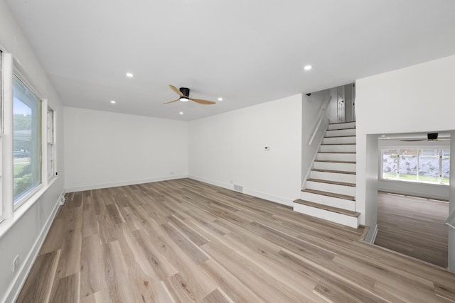 16030 University Ave, South Holland, IL 60473 - unfurnished living room with stairway, ceiling fan, plenty of natural light, light wood-type flooring, and recessed lighting