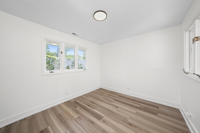 16030 University Ave, South Holland, IL 60473 - empty room featuring light wood-type flooring and baseboards