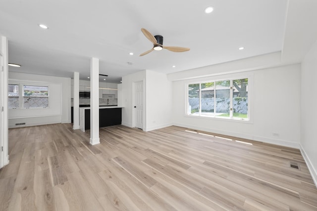 16030 University Ave, South Holland, IL 60473 - unfurnished living room with ceiling fan, light wood finished floors, and recessed lighting