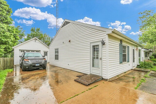 907 E Glenview Dr, Tuscola, IL 61953 - view of home's exterior with a garage and driveway