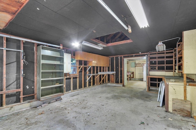 907 E Glenview Dr, Tuscola, IL 61953 - misc room featuring concrete floors