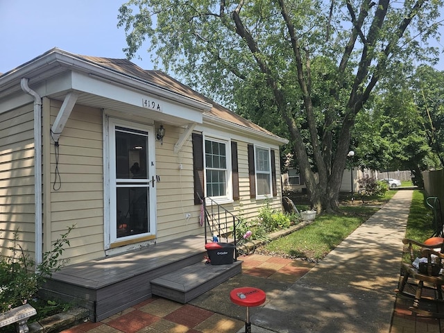 419 Sidney Ave Unit A, Glendale Heights, IL 60139 - view of side of property with a wooden deck