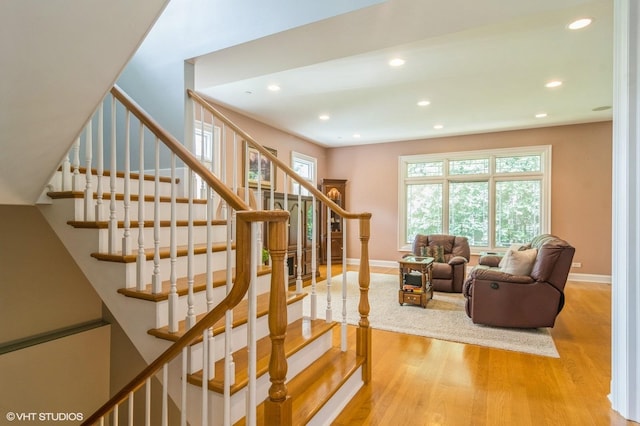 706 French Way Unit 2, Mount Prospect, IL 60056 - stairs featuring wood finished floors, plenty of natural light, and recessed lighting