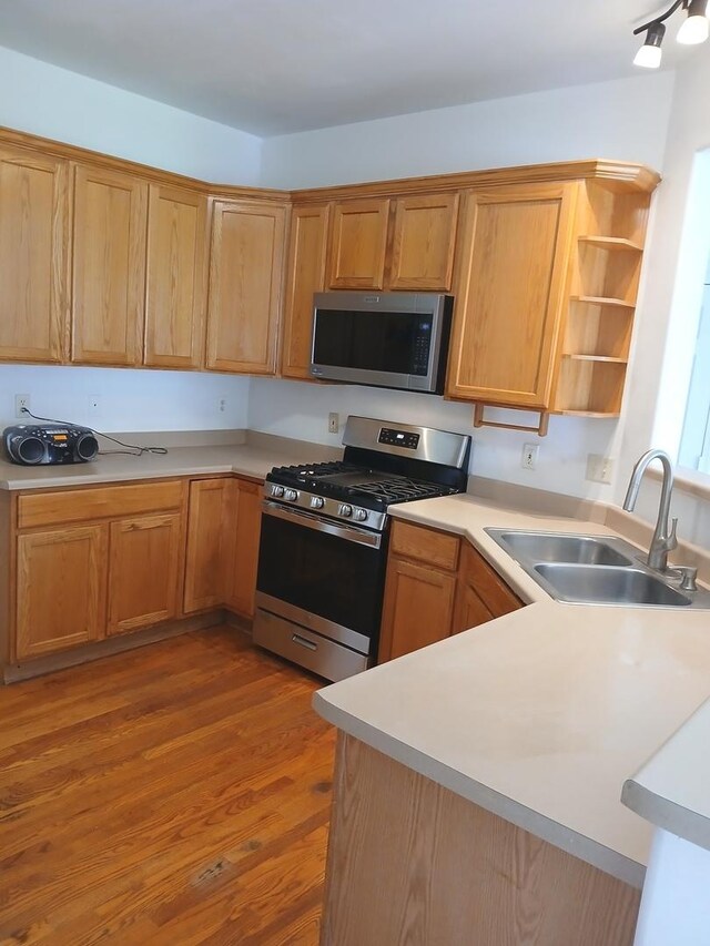 313 Manning Dr, Dekalb, IL 60115 - kitchen with stainless steel appliances, open shelves, and light countertops