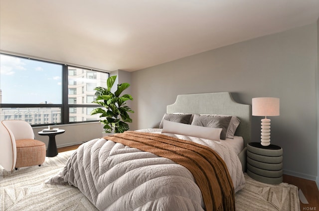 400 E Ohio St Unit 2302, Chicago, IL 60611 - bedroom featuring wood finished floors and baseboards