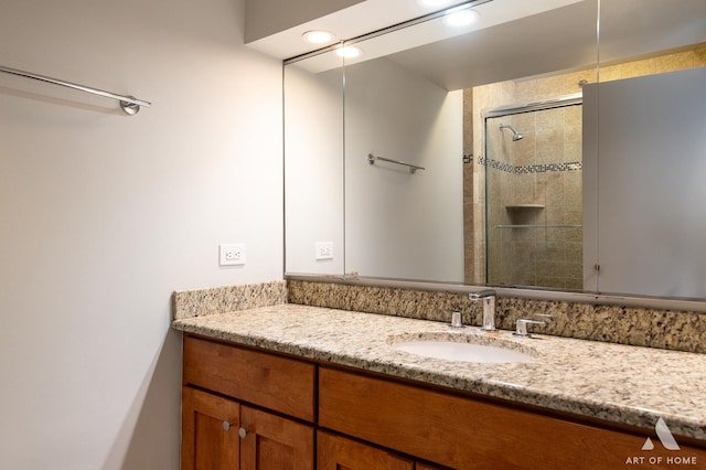 400 E Ohio St Unit 2302, Chicago, IL 60611 - bathroom with vanity, a tile shower, and recessed lighting