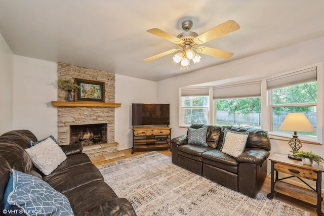 881 Twisted Oak Ln, Buffalo Grove, IL 60089 - living room featuring wood finished floors, a ceiling fan, and a stone fireplace