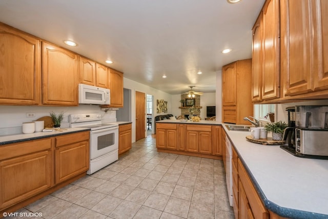 881 Twisted Oak Ln, Buffalo Grove, IL 60089 - kitchen featuring white appliances, a peninsula, recessed lighting, light tile patterned flooring, and ceiling fan