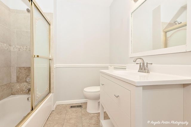 208 W Nippersink Rd, Round Lake, IL 60073 - full bathroom with vanity, bath / shower combo with glass door, and tile patterned flooring