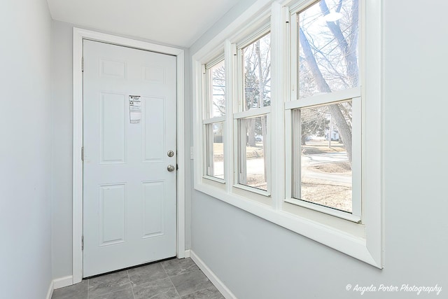 208 W Nippersink Rd, Round Lake, IL 60073 - entryway featuring baseboards and marble finish flooring