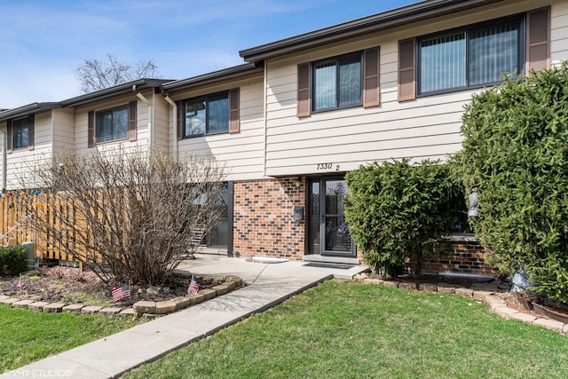 7330 Winthrop Way Unit 2, Downers Grove, IL 60515 - view of front of home with brick siding and a front yard