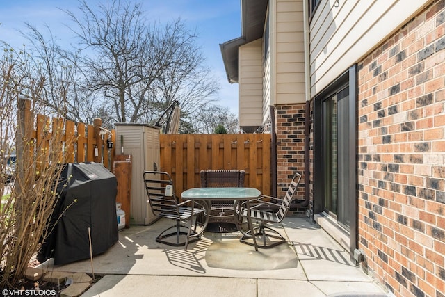 7330 Winthrop Way Unit 2, Downers Grove, IL 60515 - view of patio with a grill and outdoor dining area