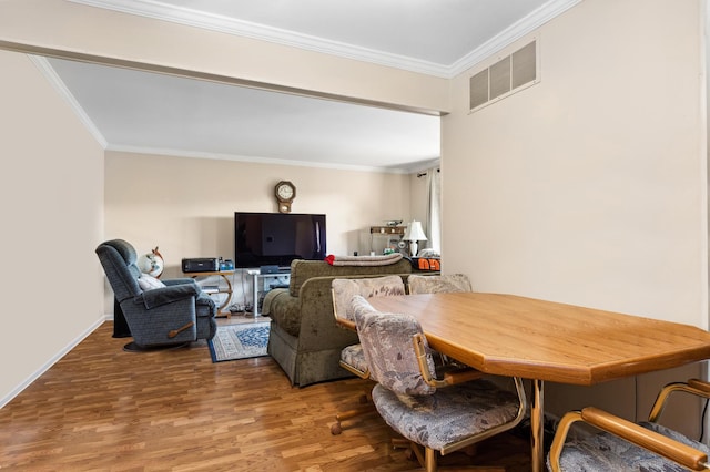 7330 Winthrop Way Unit 2, Downers Grove, IL 60515 - dining room with crown molding and wood finished floors