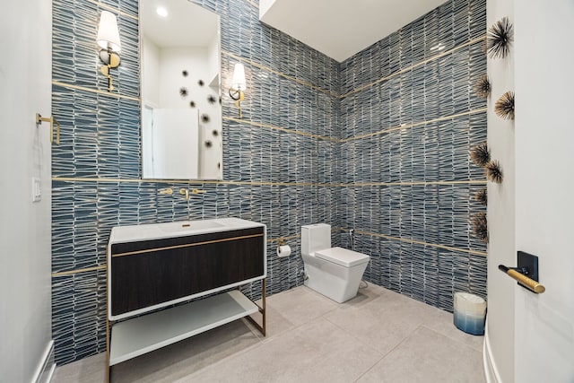 2110 Pfingsten Rd, Northbrook, IL 60062 - bathroom featuring tile walls, pet washing area, tile patterned floors, vanity, and heating unit