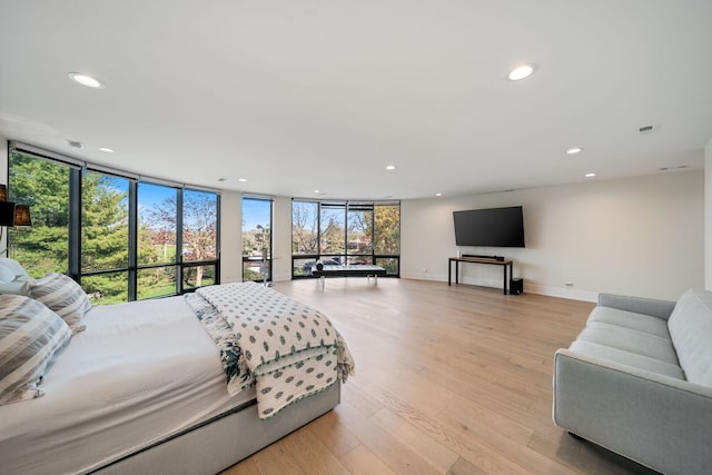 2110 Pfingsten Rd, Northbrook, IL 60062 - bedroom featuring recessed lighting, light wood finished floors, and floor to ceiling windows