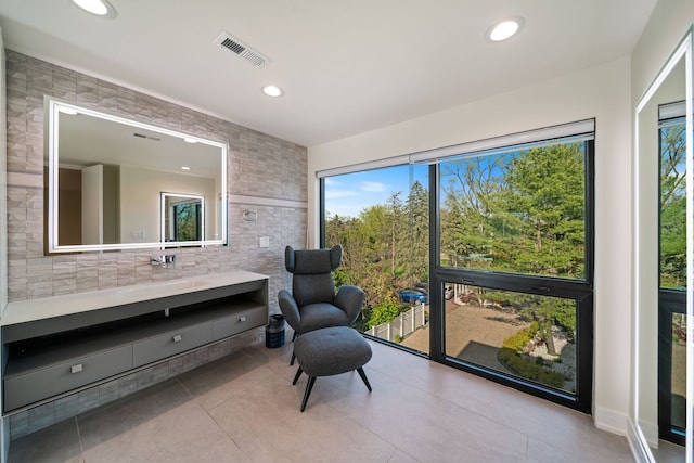 2110 Pfingsten Rd, Northbrook, IL 60062 - living area with tile patterned flooring, plenty of natural light, and recessed lighting