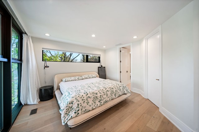 2110 Pfingsten Rd, Northbrook, IL 60062 - bedroom featuring light wood finished floors and recessed lighting