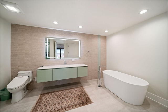 2110 Pfingsten Rd, Northbrook, IL 60062 - full bath featuring vanity, a freestanding tub, and recessed lighting