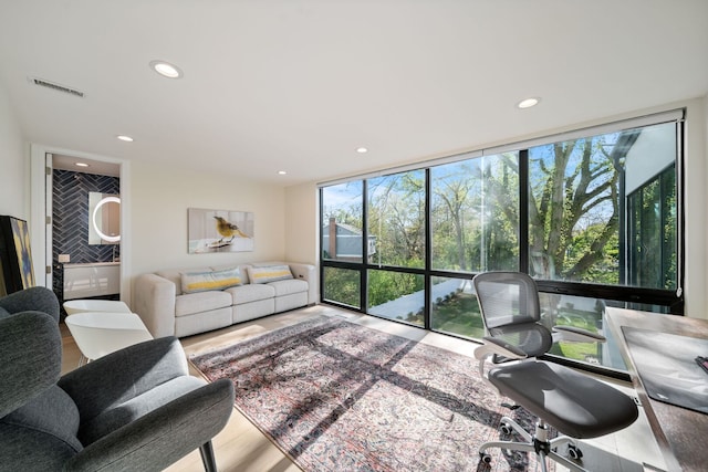 2110 Pfingsten Rd, Northbrook, IL 60062 - living room featuring recessed lighting, floor to ceiling windows, and wood finished floors