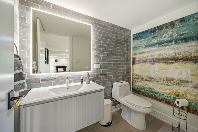 2110 Pfingsten Rd, Northbrook, IL 60062 - bathroom featuring vanity and wood finished floors