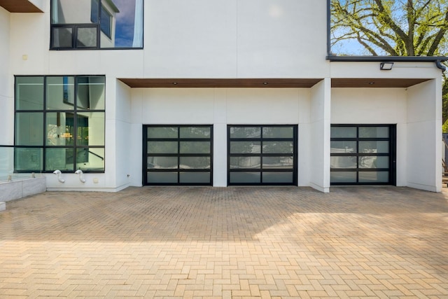 2110 Pfingsten Rd, Northbrook, IL 60062 - garage with decorative driveway